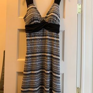 New with tags- Speechless Dress size medium. Beautiful and flattering dress